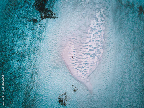 Obraz na płótnie Aerial drone photo - A woman in the Maldives islands. w salonie