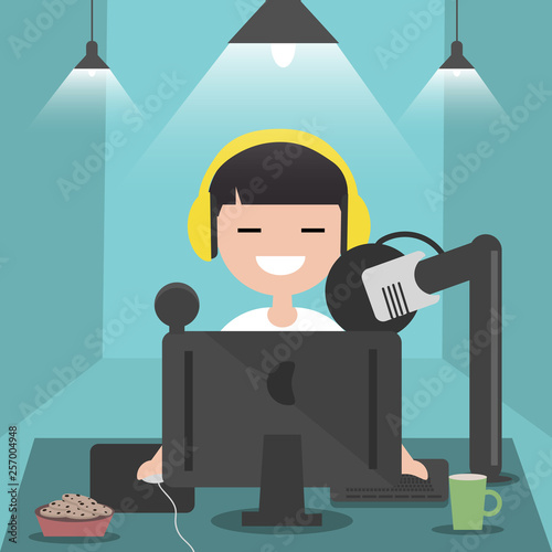 Young character sitting at computer desk.Streaming.Cloud gaming service.Flat cartoon design.Clip art