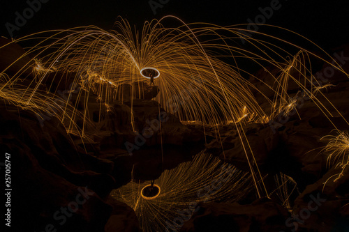 Картината върху платно March 9, 2019 Sam Pan Bok , Ubolratchathani province, man fling the lights, an exciting experience for photography