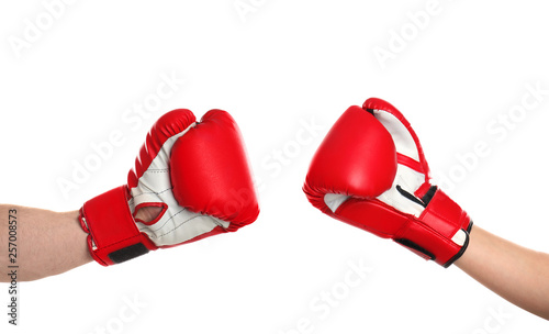 Men in boxing gloves on white background, closeup © New Africa