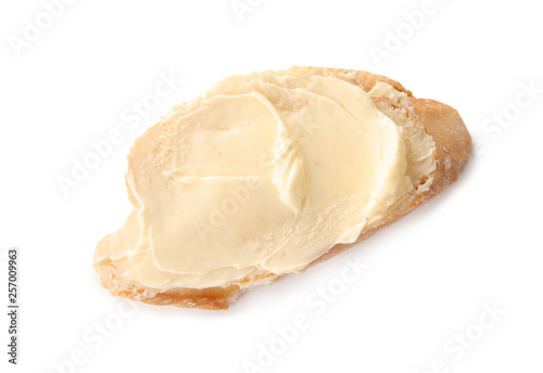 Fresh bread with butter on white background, top view