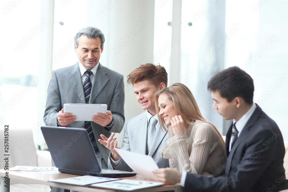 close up.businessman and business team analyzing financial data. photo with copy space close up.businessman and business team analyzing financial data. photo with copy space