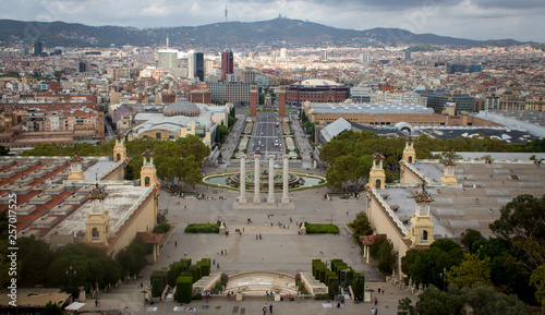 Barcelona panorama with mountains in background and square with columns in foreground