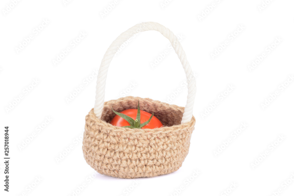 Tomato in Basket Isolated on White Background.
