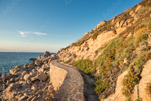 Landscape with Sea, Stones, Road and Coast of Santa Teresa di Gallura in North Sardinia. photo