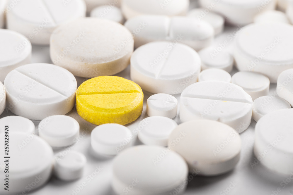 Assorted pharmaceutical medicine pills, tablets and capsules.Pills background. Assorted pharmaceutical medicine pills, tablets and capsules.Pills background.
