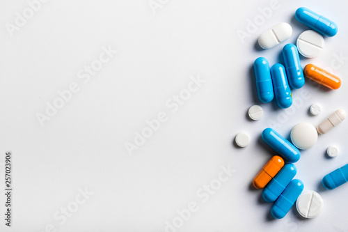 Assorted pharmaceutical medicine pills, tablets and capsules.Pills background. photo
