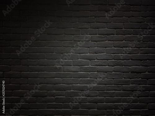 Black colored brick wall. Vintage brick and block wall in room.