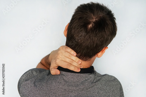 Принти на полотні man feeling exhausted and suffering from neck pain, Health concept