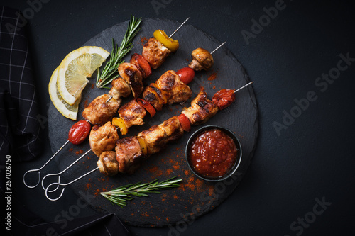 Shish kebab with mushrooms, cherry tomato and sweet pepper, Grilled meat skewers photo