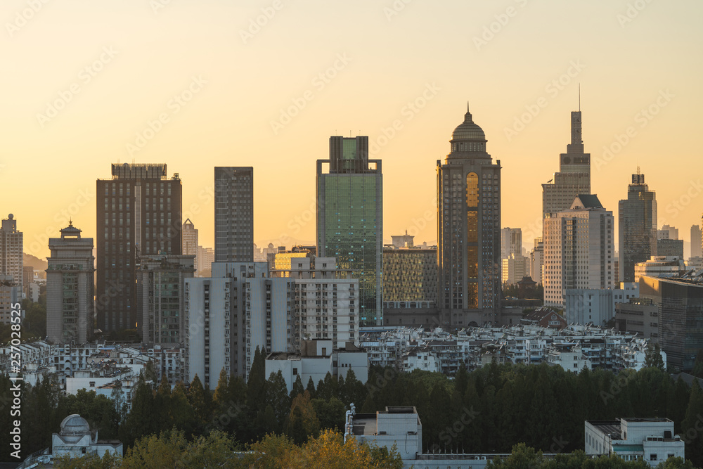 Modern city building sunset