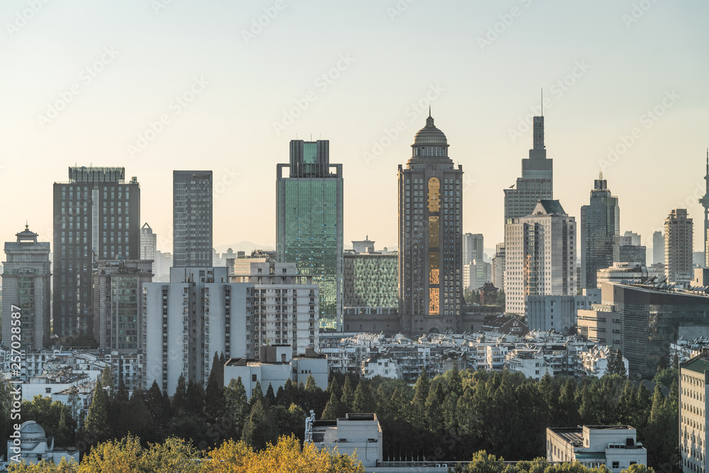 Modern city building sunset
