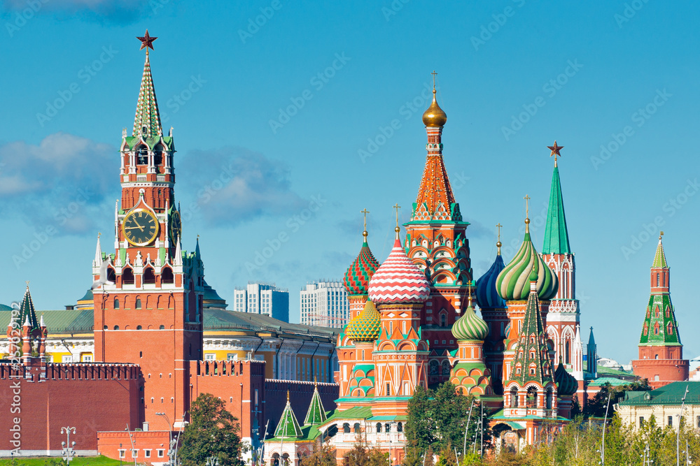 Spasskaya Tower and Cathedral of Vasily the Blessed (Saint Basil's Cathedral) on Red Square. Moscow. Russia Spasskaya Tower and Cathedral of Vasily the Blessed (Saint Basil's Cathedral) on Red Square. Moscow. Russia