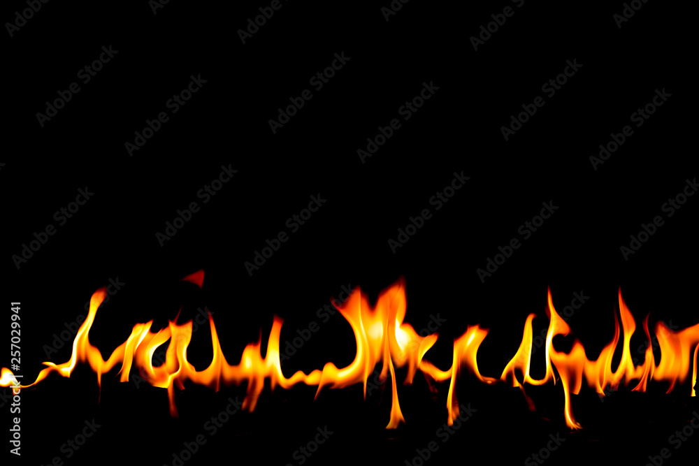 Fire flames on Abstract art black background, Burning red hot sparks rise, Fiery orange glowing flying particles Fire flames on Abstract art black background, Burning red hot sparks rise, Fiery orange glowing flying particles
