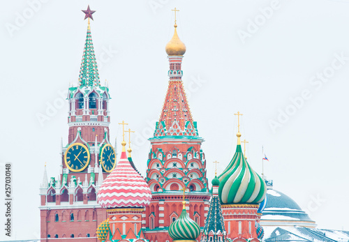Spasskaya Tower of Moscow Kremlin and the Cathedral of Vasily the Blessed (Saint Basil's Cathedral) on Red Square. Winter day. Moscow. Russia