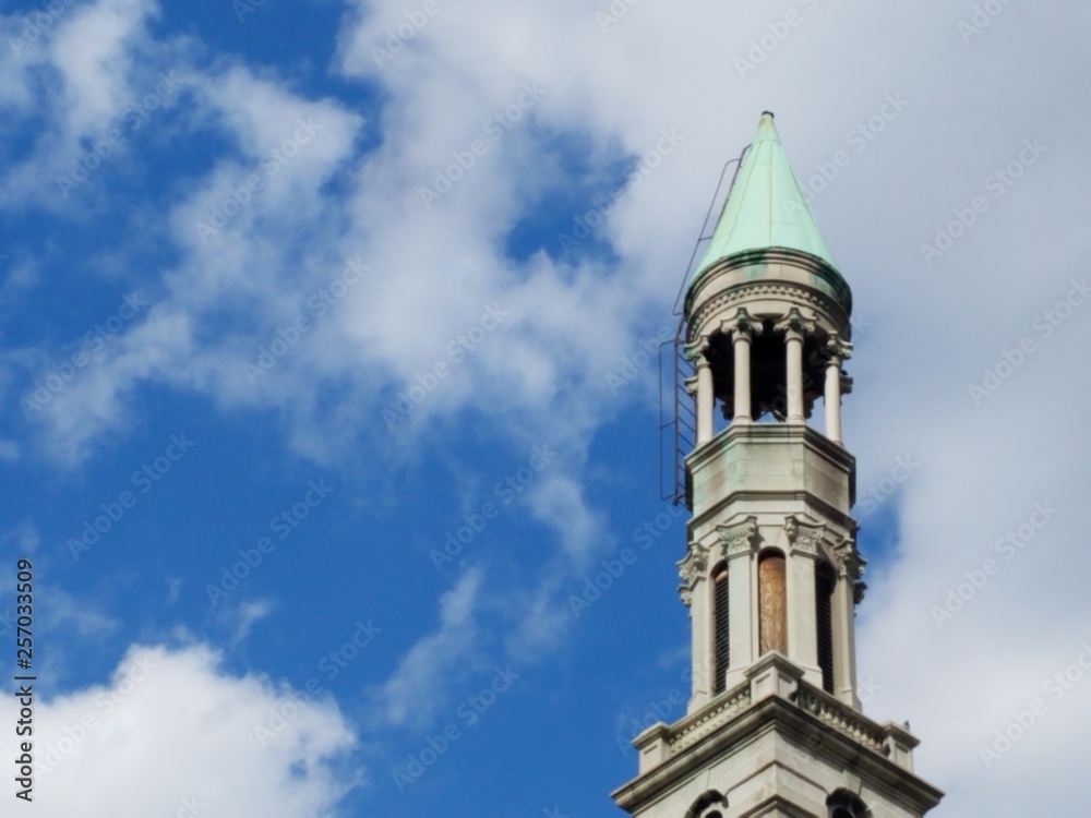 church tower against bright sky