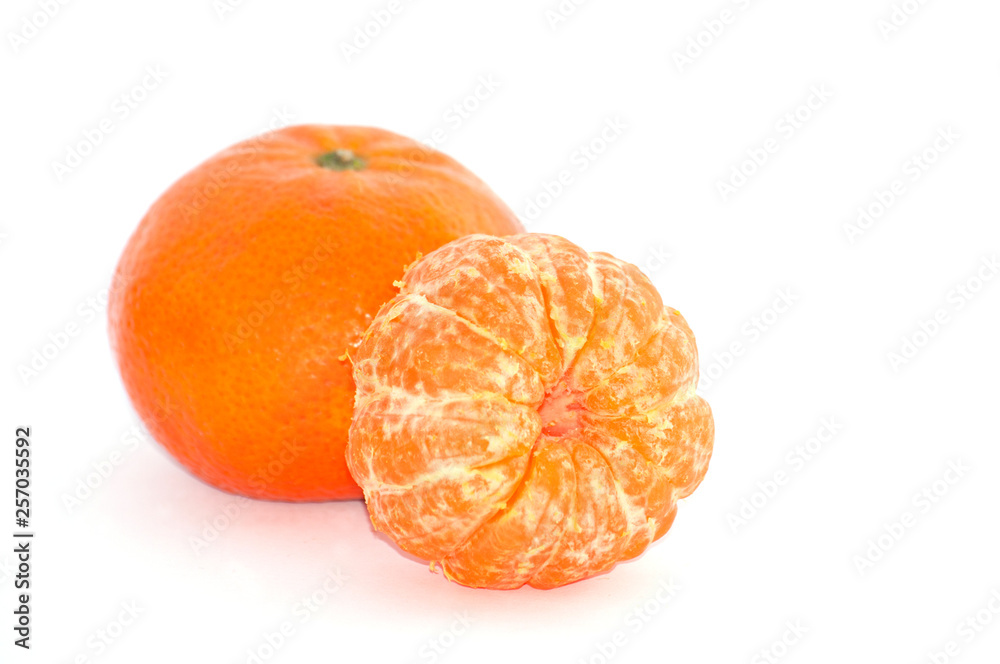 Two juicy tangerine on white background, macro Two juicy tangerine on white background, macro