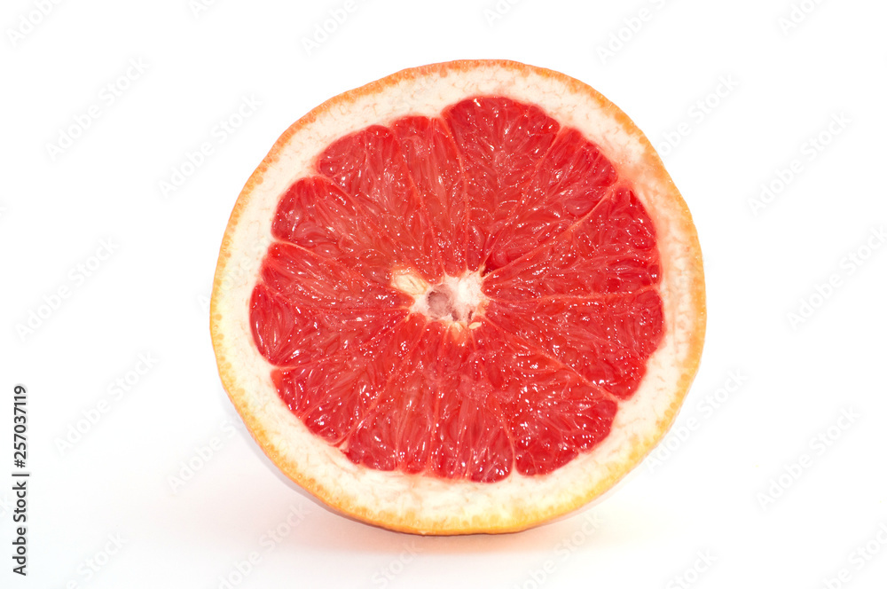 Slices of grapefruit macro closeup on white background Slices of grapefruit macro closeup on white background