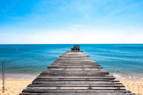 Sea view, blue sky, old wooden bridge, beautiful summer