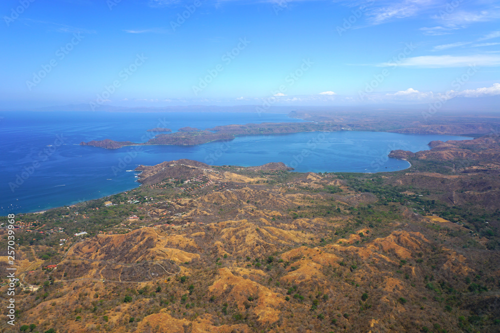 Aerial view of the Golfo del Papagayo with the Peninsula Papagayo near Liberia, Guanacaste, Costa Rica, during the dry season