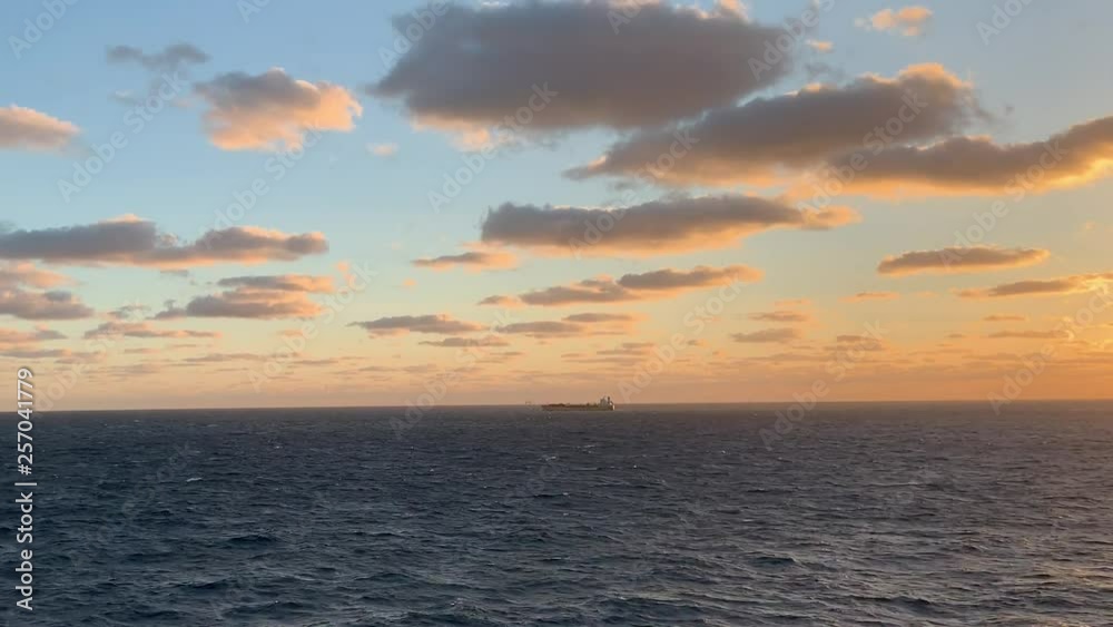 Beautiful golden sunrise over the open seas with copy space Beautiful golden sunrise over the open seas with copy space