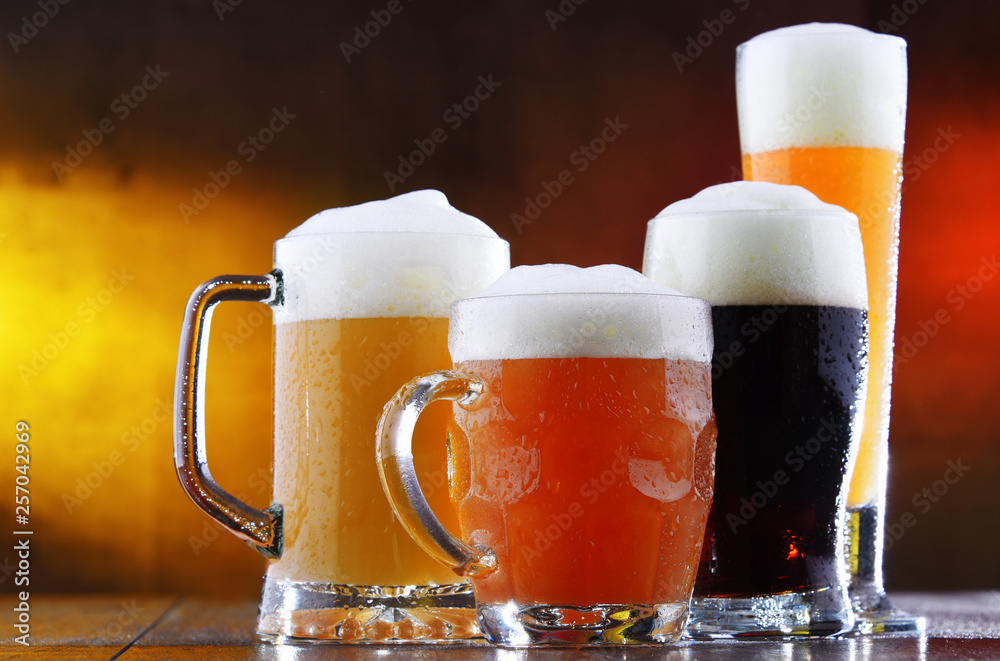 Composition with four glasses of beer