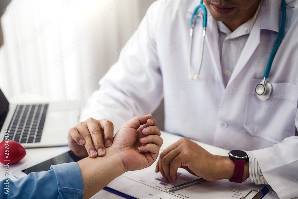 Doctor checking health primary of male patient for consultation health in hospital health. health and doctor concept. Doctor checking health primary of male patient for consultation health in hospital health. health and doctor concept.