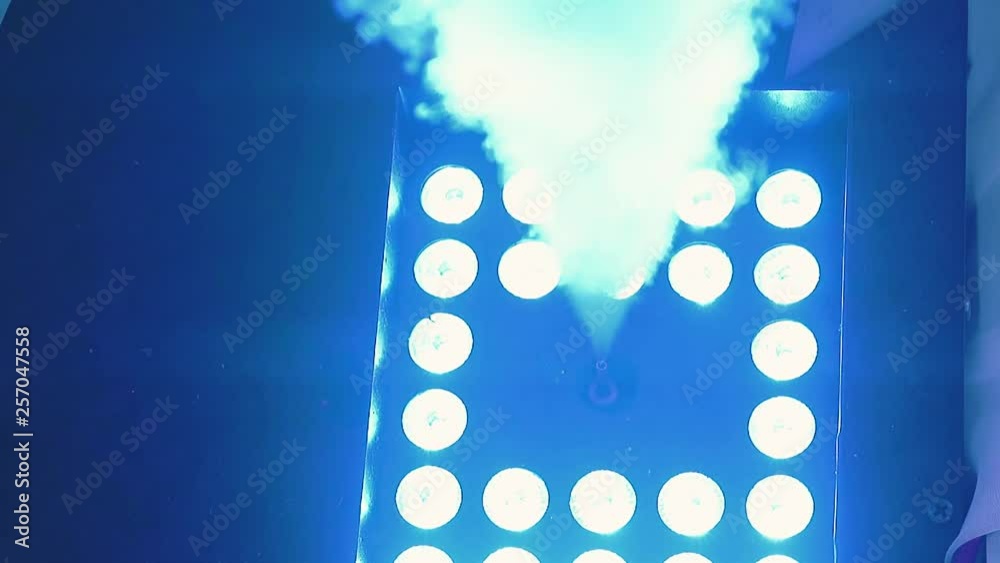 smoke bomb works in disco, the smoke is highlighted by different light, close-up, slow motion