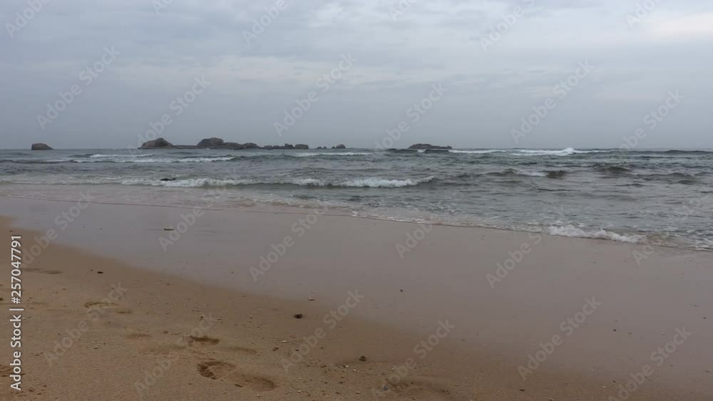 View of Indian Ocean from Hikkaduwa Beach in Hikkaduwa, Sri Lanka. Popular touristic asian destination. Seascape. Landscape. Vacation destination View of Indian Ocean from Hikkaduwa Beach in Hikkaduwa, Sri Lanka. Popular touristic asian destination. Seascape. Landscape. Vacation destination