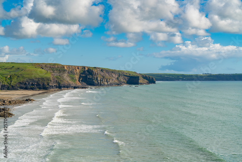 Coast and clouds at Madoc's Haven, near Nolton Haven, Pembrokeshire, Dyfed, Wales, UK photo