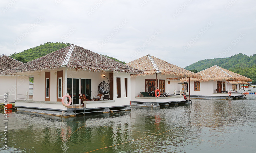 Raft House floating on the river with mountain at kanchanaburi, Resort in thailand.