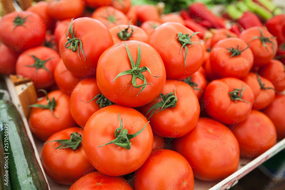 Fresh red ripe tomatoes at farmers market Fresh red ripe tomatoes at farmers market