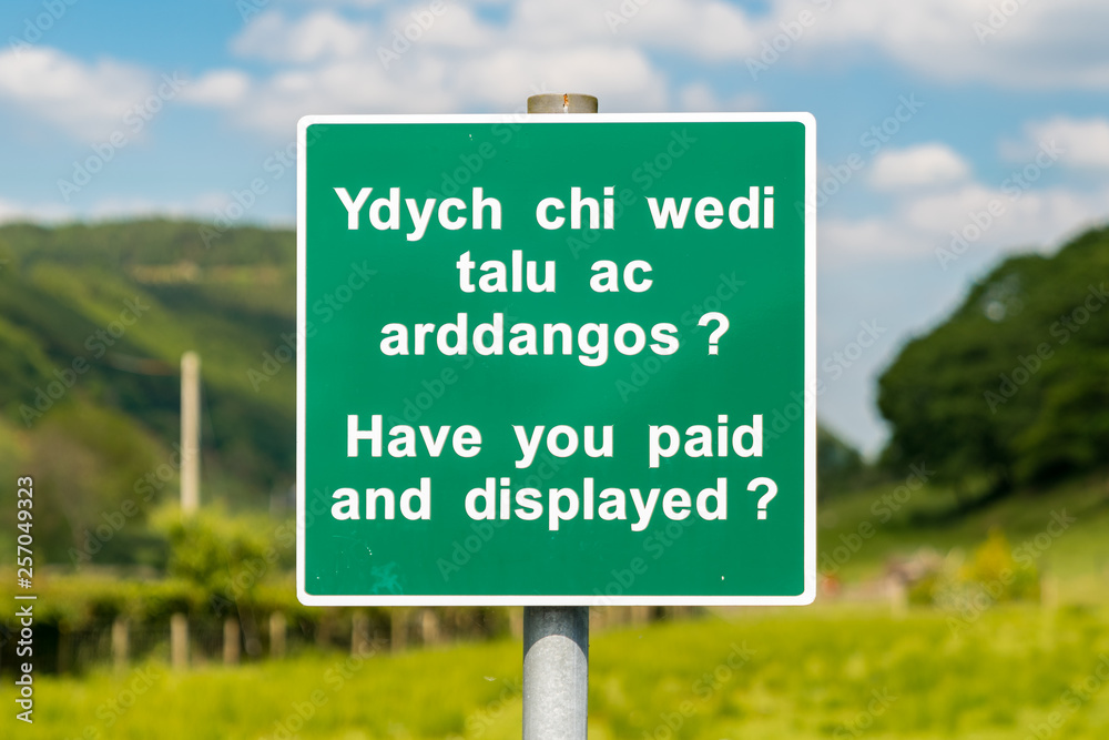 Sign: Have you paid and displayed (Welsh & English), seen in Dolgoch, Gwynedd, Wales, UK Sign: Have you paid and displayed (Welsh & English), seen in Dolgoch, Gwynedd, Wales, UK
