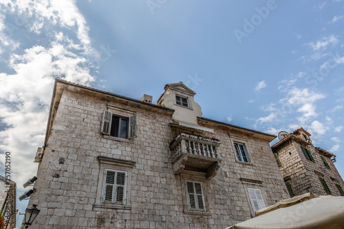 Fototapeta Naklejka Na Ścianę i Meble -  Typical facade of an old building in the narrow medieval streets in the old town of Kotor, Montenegro
