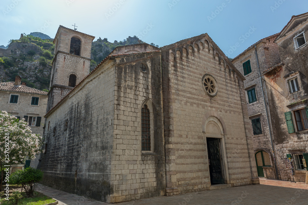 Facade of an old church in the old town of the medieval city of Kotor, Montenegro