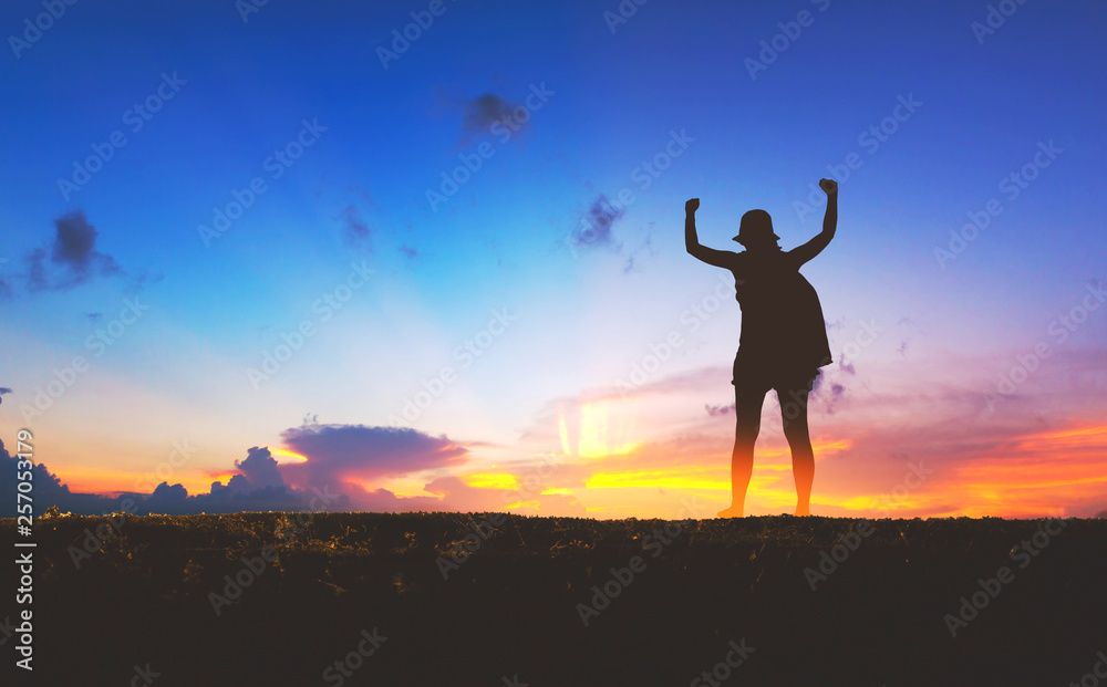 Silhouette of happy travel woman