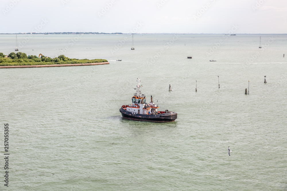 Surveillance boat in the coastal area of ​​Venice, in a calm sea