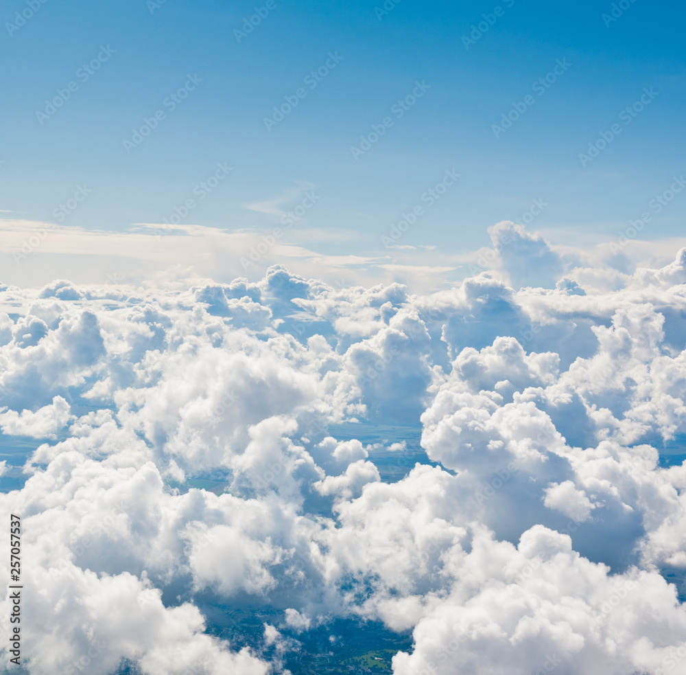 Fototapeta premium Aerial view, the large fluffy clouds above the land