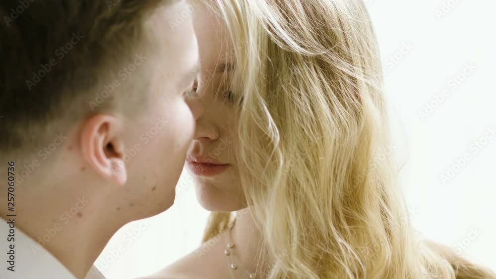 Sexual relationship. Close-up shot of happy couple making out, kissing on lips gently. 4K Sexual relationship. Close-up shot of happy couple making out, kissing on lips gently. 4K