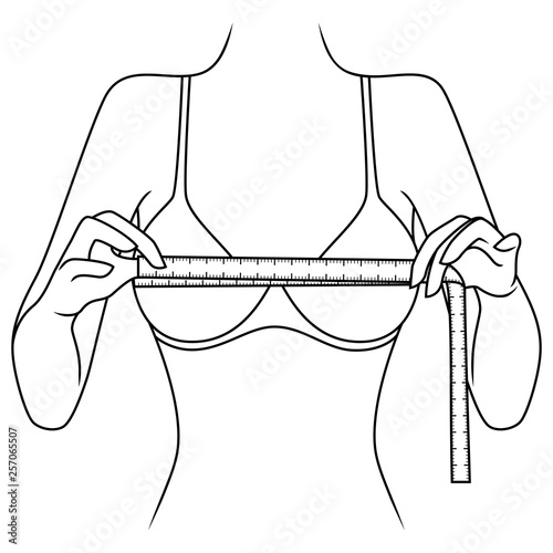 Woman measuring the size of her chest