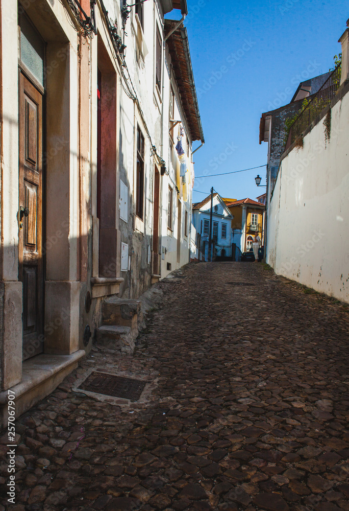 old paved street in Coimbra, Portugal