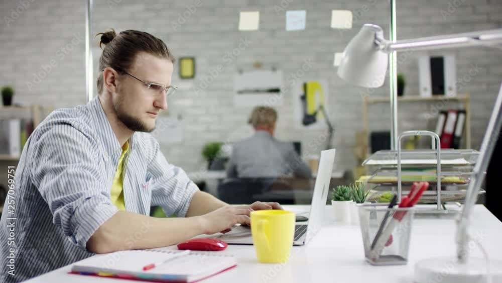 Productive disciplined businessman leaning back finishing office work on laptop, effective manager satisfied with meeting deadline, feels relief after job done, stretching hands relaxed completed all Productive disciplined businessman leaning back finishing office work on laptop, effective manager satisfied with meeting deadline, feels relief after job done, stretching hands relaxed completed all