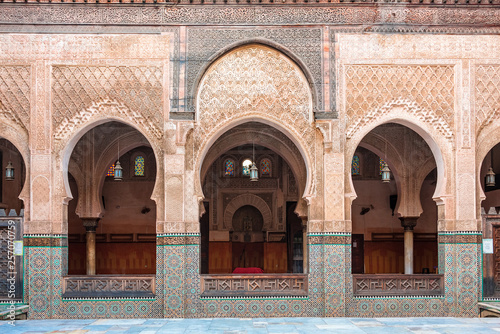 FES, MOROCCO - NOVEMBER 16, 2018: Inside interior of The Madrasa Bou Inania ( Medersa el Bouanania ) is acknowledged as an excellent example of Marinid architecture. Medina of Fes, Morocco