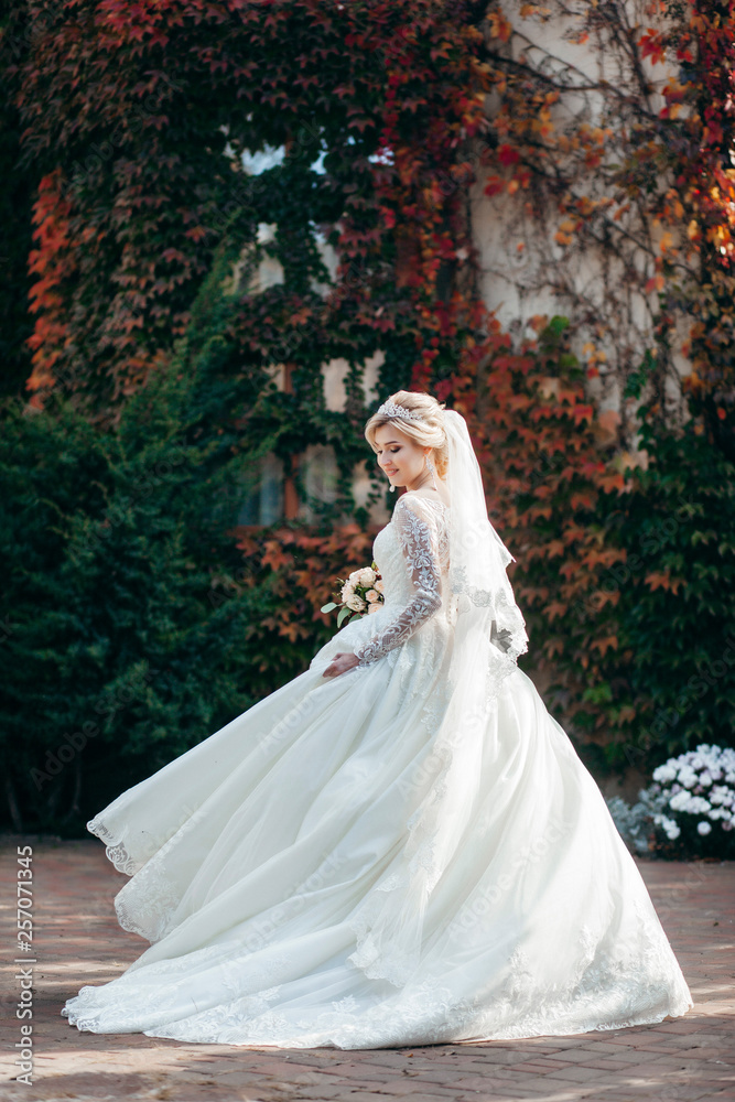 Portrait of a young beautiful bride with a bouquet Portrait of a young beautiful bride with a bouquet
