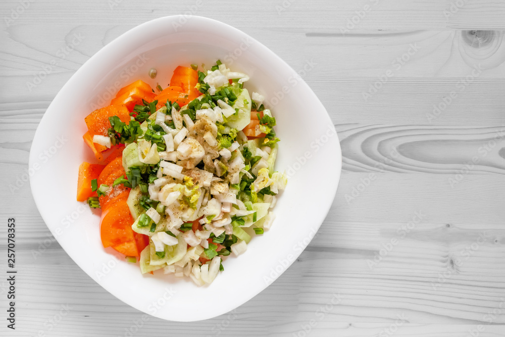vitamin salad of tomatoes, celery stalks, fennel and green onions seasoned with black pepper and spicy herbs vitamin salad of tomatoes, celery stalks, fennel and green onions seasoned with black pepper and spicy herbs