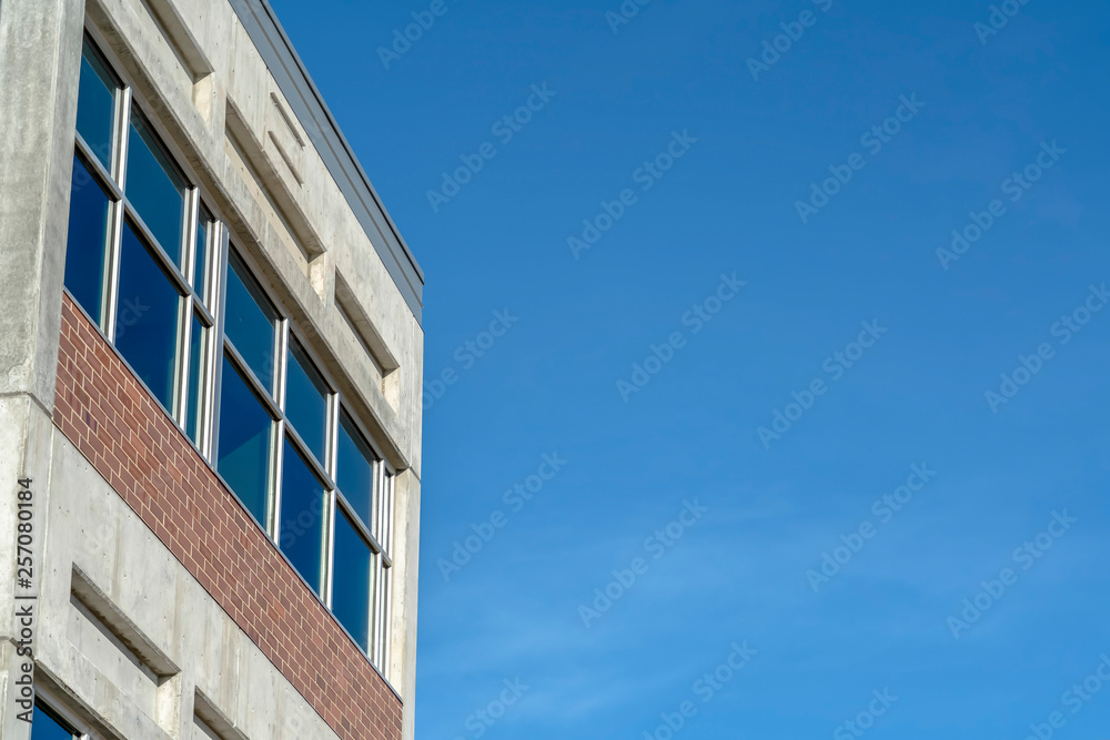 A concrete building with blue sky background A concrete building with blue sky background