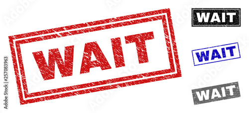 Grunge WAIT rectangle stamp seals isolated on a white background. Rectangular seals with grunge texture in red, blue, black and gray colors.