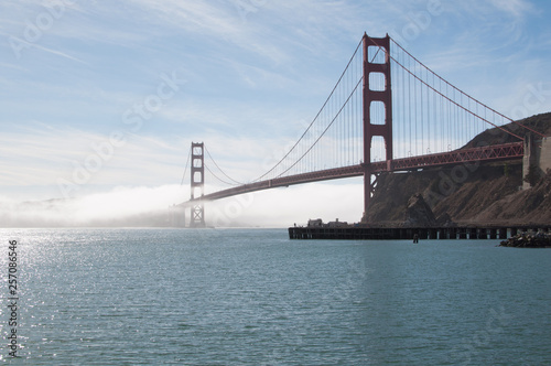 Fototapeta Naklejka Na Ścianę i Meble -  Dramatic Shimmering Golden Gate Bridge