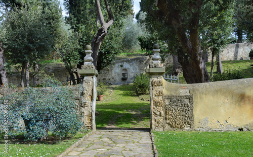 Secret garden with sculptures on the fille Gambéraia in Settignano. Upper garden in Villa Gamberaia. photo