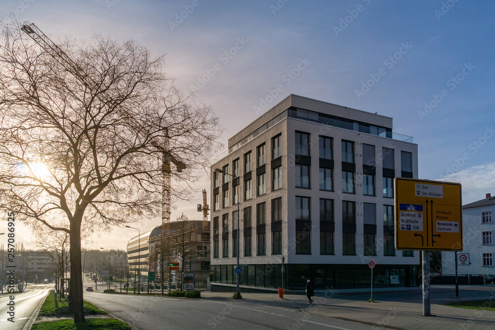 modern building and street - evening sun